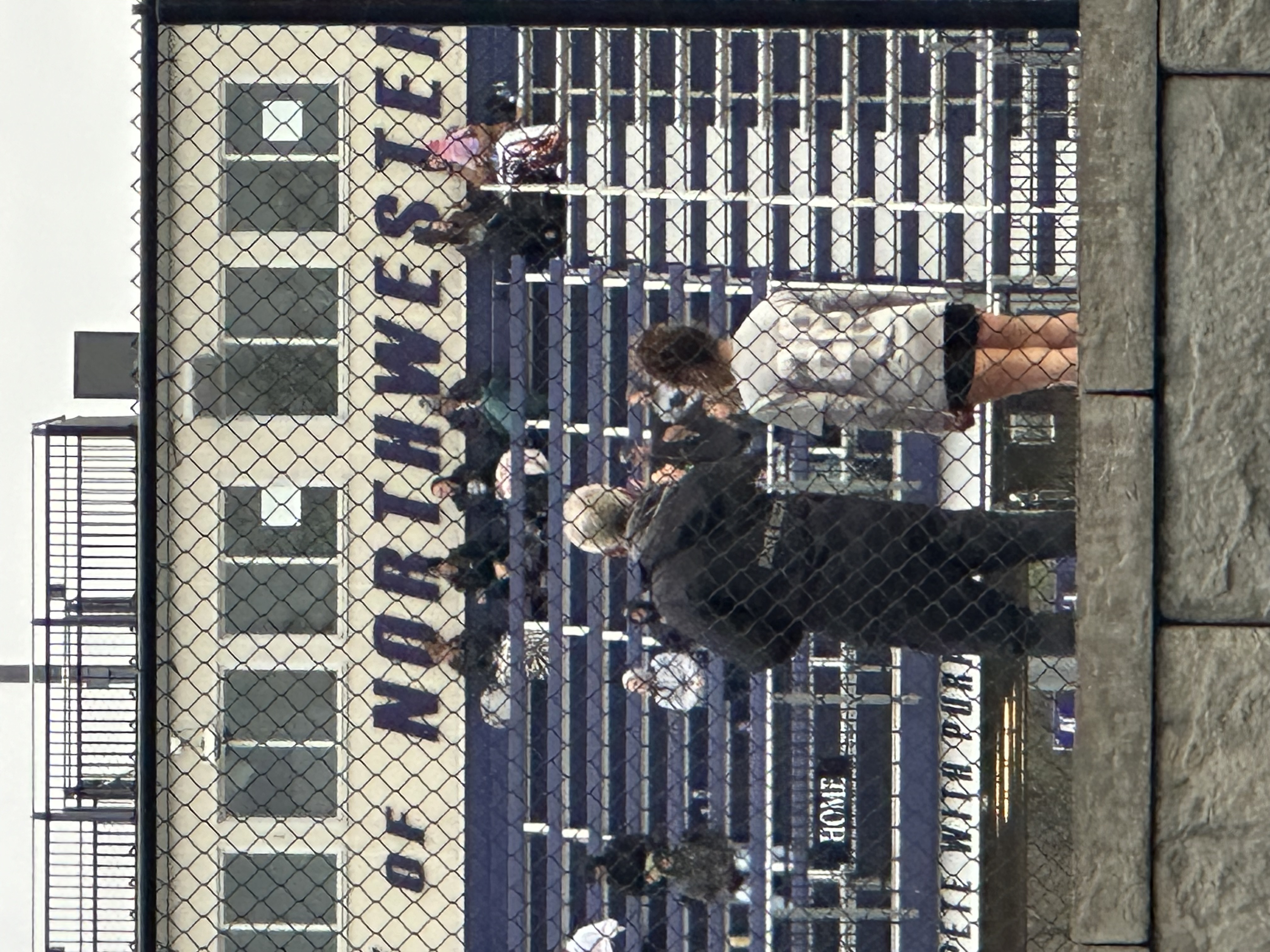 Soccer coach with clipboard on the training field